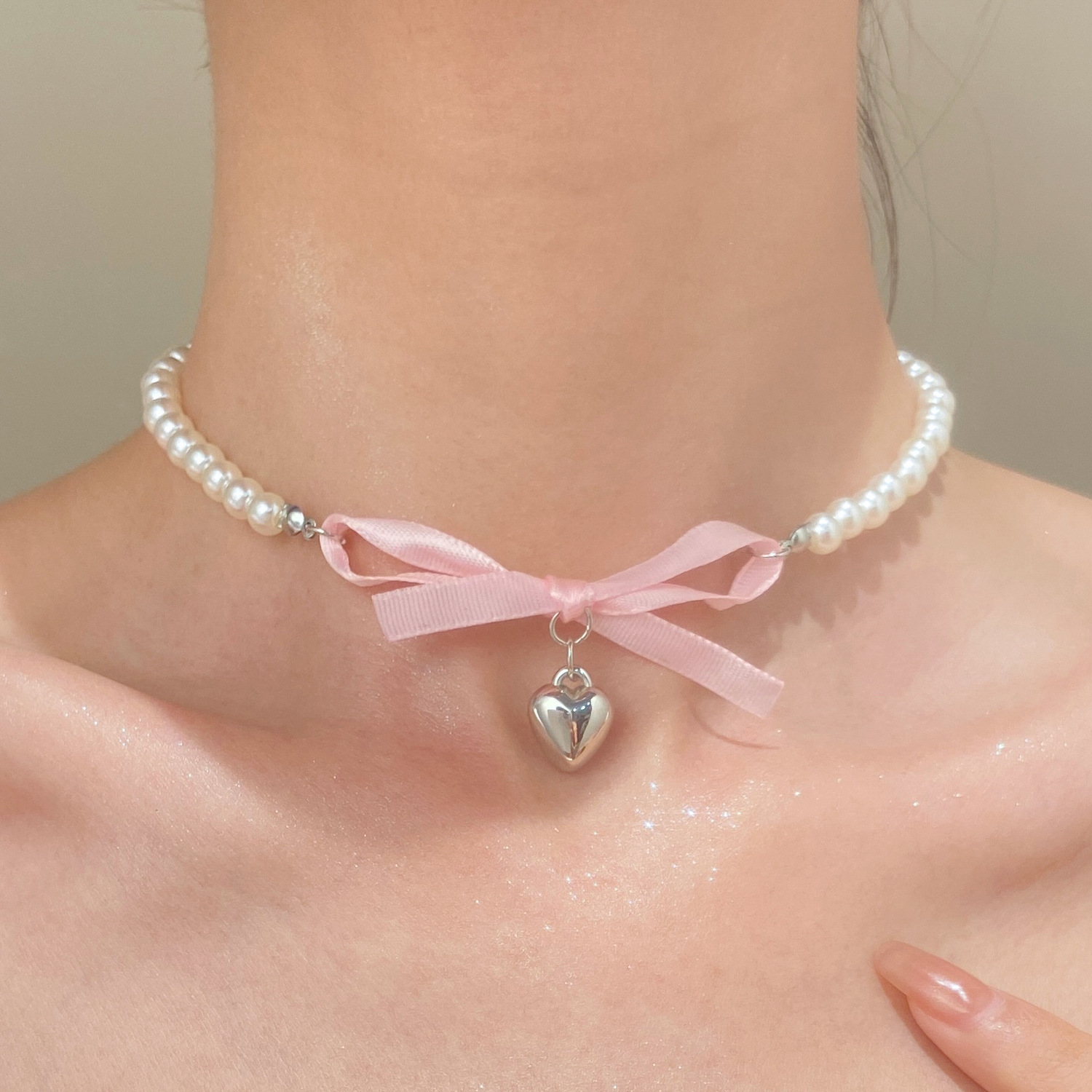 สร้อยคอไข่มุกจี้รูปโบว์สีชมพูโ - Pearl Trim Chain บทวิจารณ์และราคา